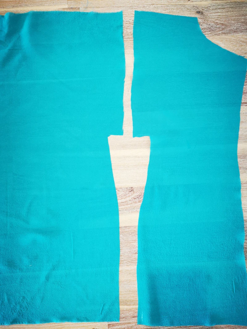 Separate turquoise centre-back and side-back fabric pieces.