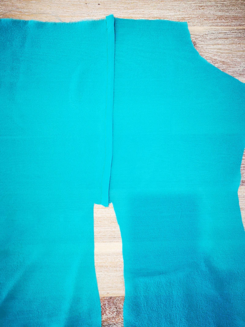 Joined shoulder-blade section with the lower portions of the back pieces still separate.