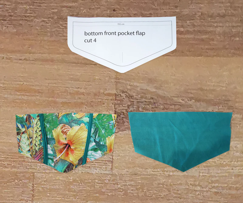 The floral flap is pieced with two green strips.